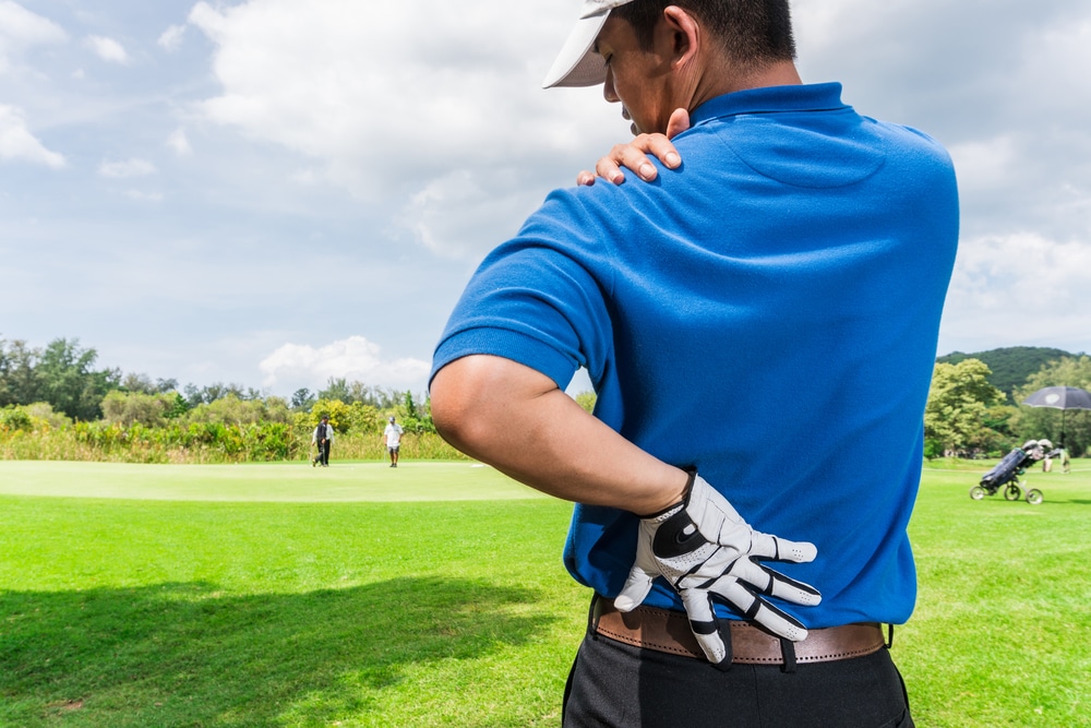 Golfer with injured back